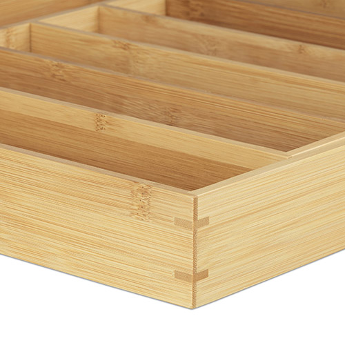 Bestikindsats i justerbart design