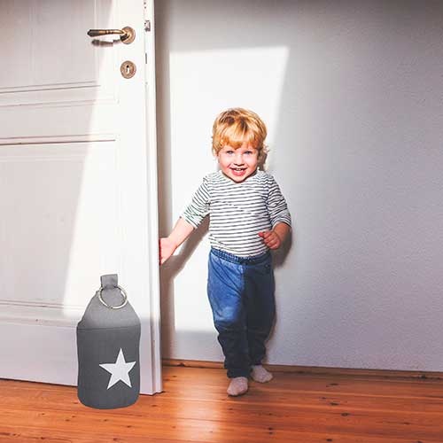 Mørkegrå dørstopper med stjerne